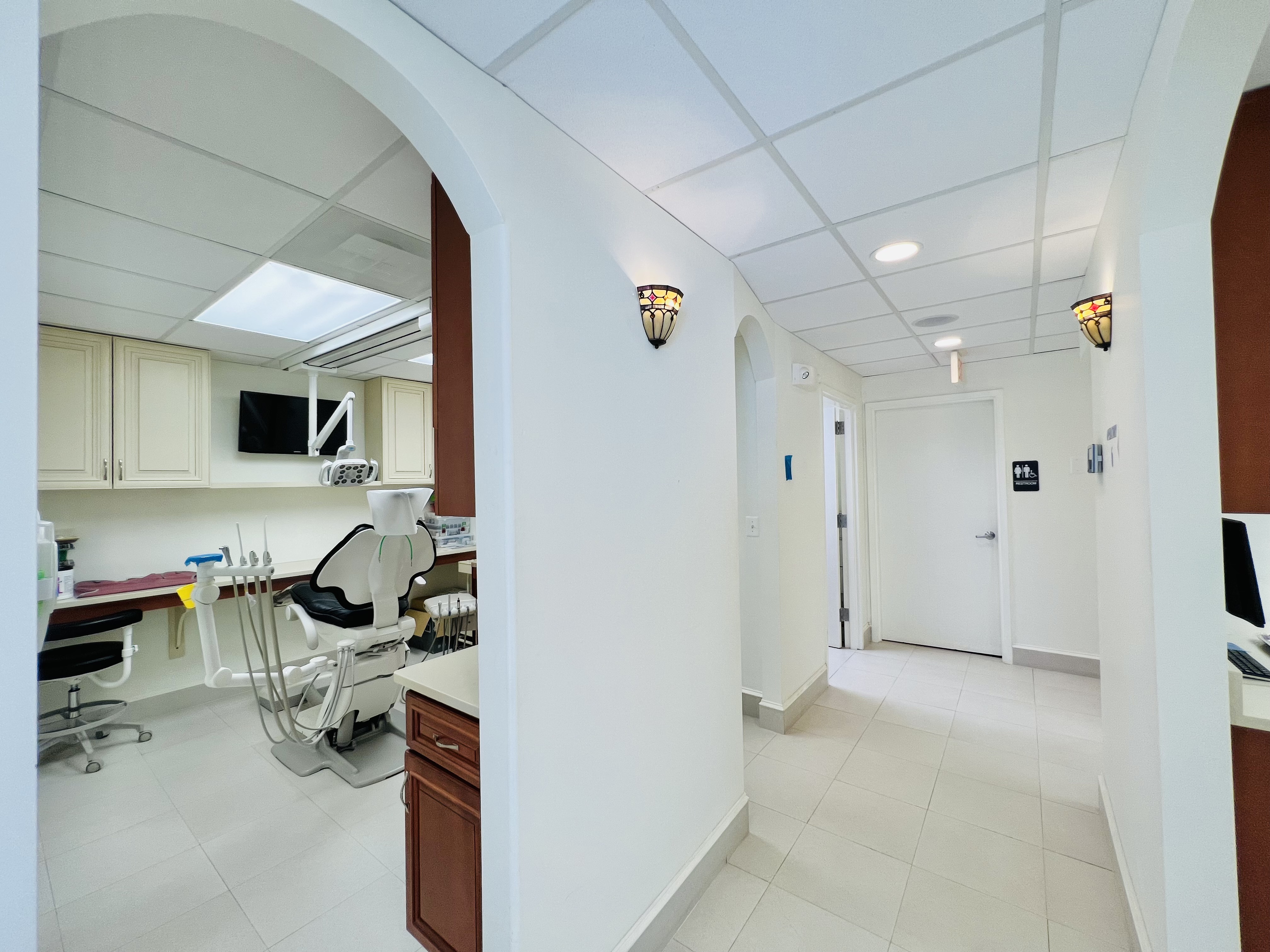 Patient chair in office with TV in Executive Dental Care Office in Rockville, MD